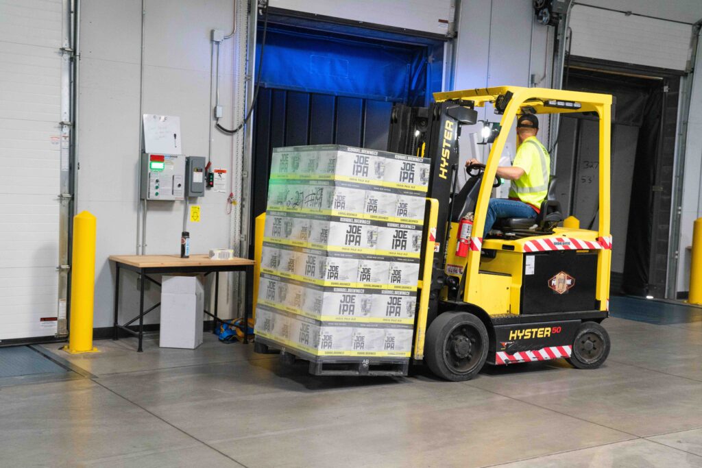 forklift driver carrying cargo