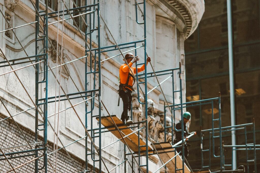 osha violation - man on scaffolding