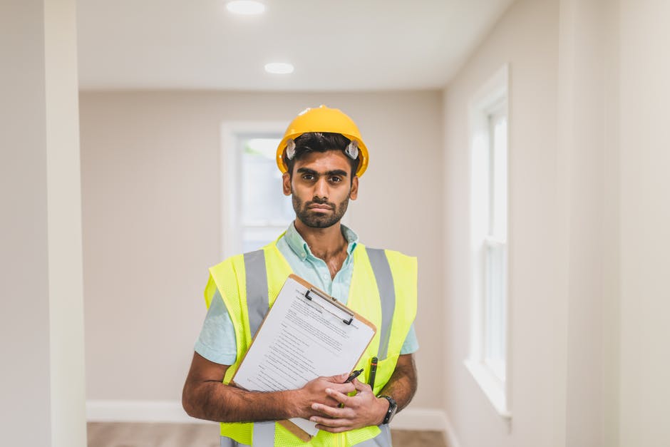 man in a hard hat who has certifications for safety professionals